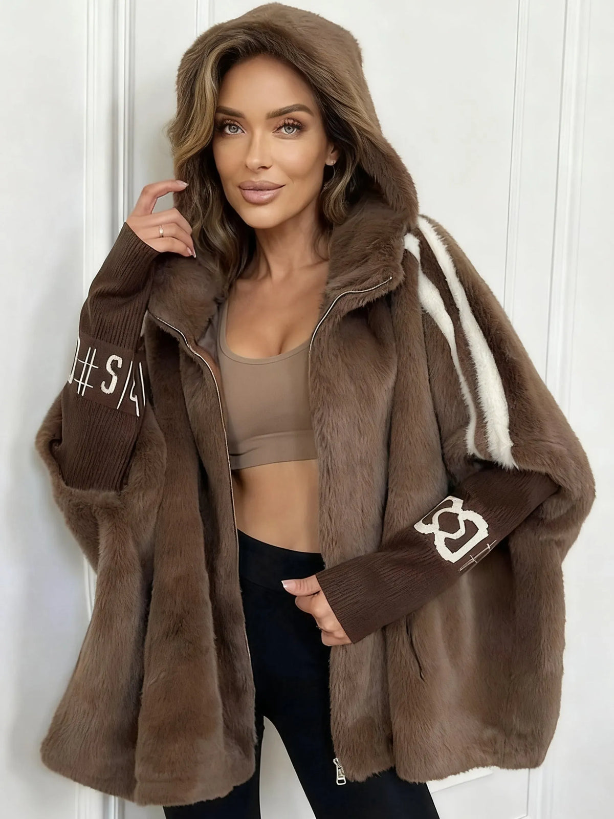 Manteau d'hiver oversize à capuche en fausse fourrure pour femme