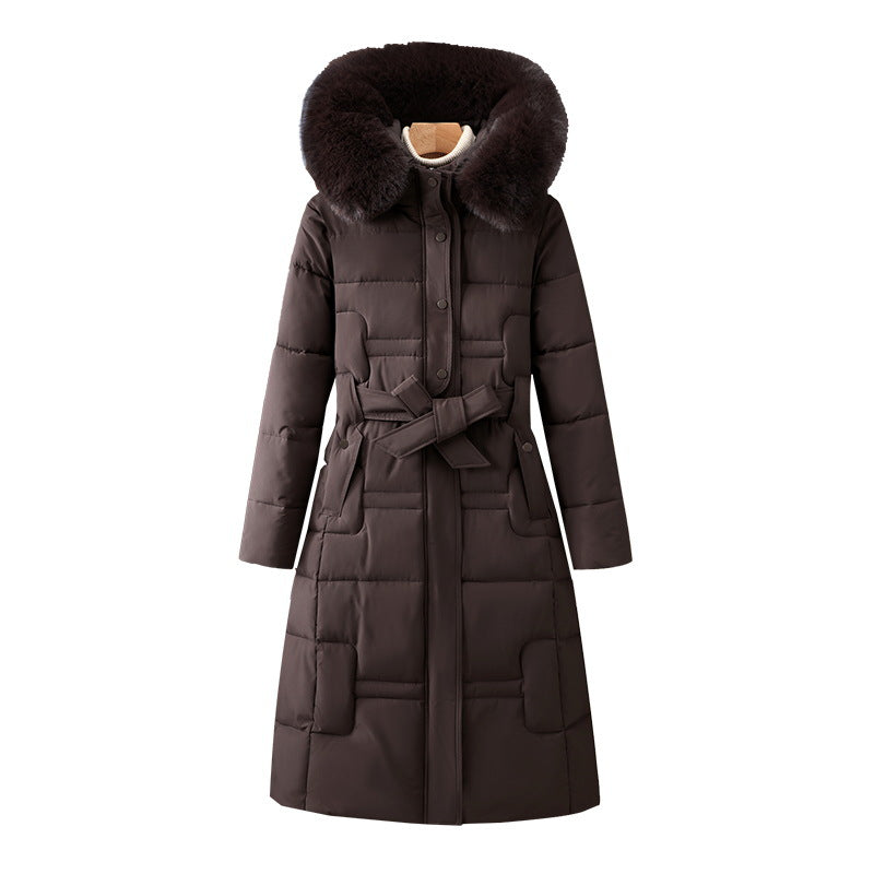 Manteau d’hiver long matelassé pour femme avec capuche en fausse fourrure et ceinture