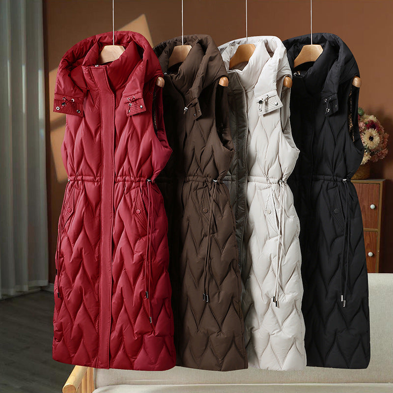 Gilet matelassé long à capuche pour femme