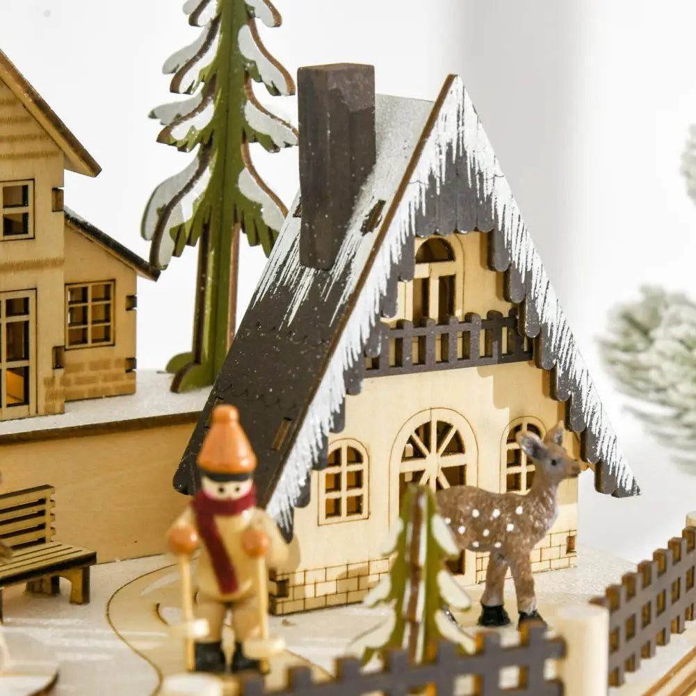 Calendrier de l’Avent représentant un village de Noël en bois avec lumières LED