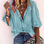 Blouse imprimée boutonnée avec manches chauve-souris