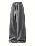 Pantalon homme à jambes larges avec cordon de serrage