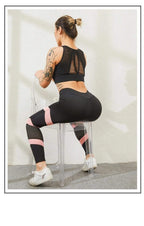 Damskie legginsy sportowe z wysokim stanem i panelami z siateczki